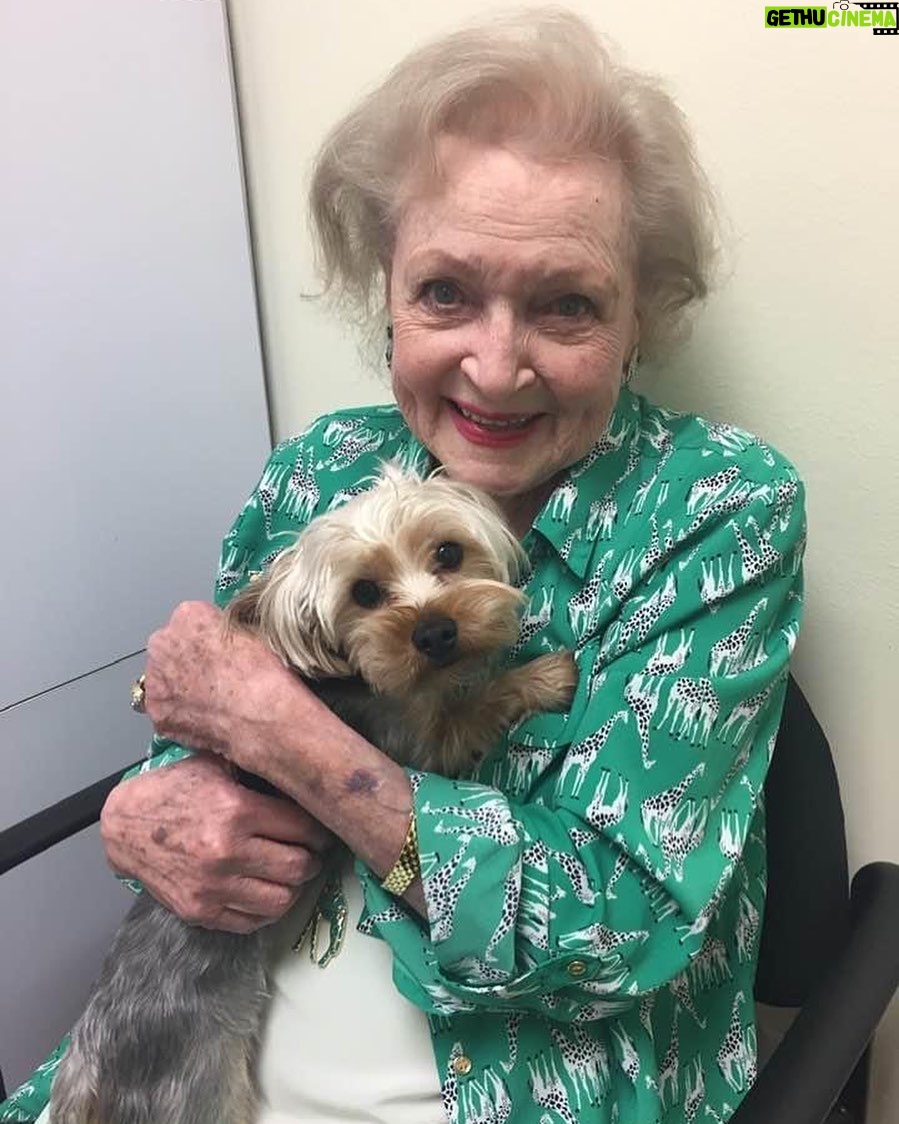 Betty White - 60.1K Likes - It’s a rainy Monday in LA so here’s a sunny smile to brighten the day :). Any time we went to appointments or meetings, we tried to have a dog or cat available for Betty to love on.
