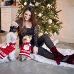 Blair Fowler Instagram - Who knew trying to get two pups to take a holiday photo was going to be so difficult? They did NOT want to look at the camera lol. But how precious are their sweaters 😱😱😱 I can’t imagine not including them in my favorite holiday activity: taking holiday photos for friends and family! Wearing these perfect holiday booties from @dswshoelovers and you best believe I’ll be wearing them all season. They’re called the “Tashley” boots and come in burgundy (what I chose), taupe, navy and black. I’m also going to rock them with a cute black dress and stockings and a deep red lip! What are your favorite holiday shoes? #MyDSW #ad #NoWrongWayToHoliday