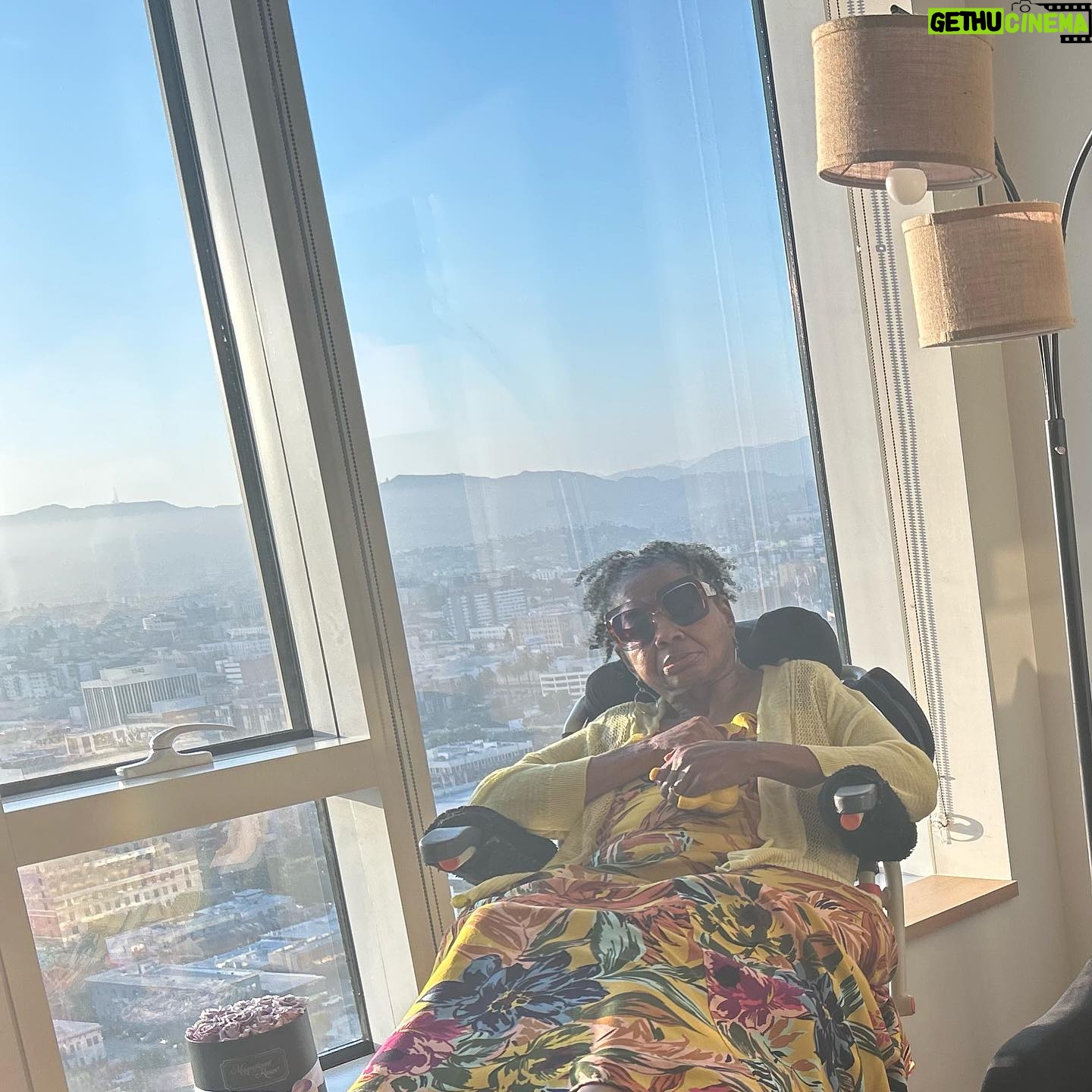 Brandee Evans Instagram - Momma’s like “Why didn’t I get to go to #EssenceFest!🙄” My caregiver just sent me these pics.🥹 Live footage of my momma patiently waiting on me to get back from @essencefest. Apparently she was living her best life watching live on @hulu I’ll be home soon momma. 🤗#CaregiverStrong Thanks for taking such good care of her Edith & Mary.