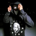 Brett Gray Instagram - STARBORN. AVAILABLE NOW brettgraymerch.com Creative Consultant / Designer: Jacob Ayers; @jsevena Styled by: @brettgray Photography: Sunny Payton; @sun_vzn Wearing: @brettgraymerch Starborn Hoodie in Blackout colorway, @badson jacket and denim, @bbsimon_officialpage belt, and Bottega “Puddle” Boots #brettgraymerch #starborn