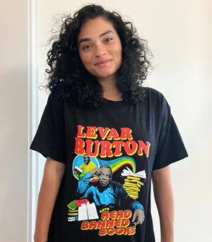 Brittany O'Grady Instagram - As a supporter of Artists Against Book Bans, you know the importance of creativity & free expression. Grab the limited edition @levarburton #ReadBannedBooks tee designed by @AlexBNYC from @MoveOn. Your shirt becomes a canvas for change! #letfreedomread