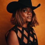 Brittany Packnett Instagram - I listened to COWBOY CARTER at midnight. This morning when I rose, I thanked God for making me a Black girl. This album made me feel the way I felt the first time I read Nikki Giovanni’s ‘Ego Trippin.’ The way I felt when I met Della Reese, who hugged a young me and said, “just a pretty chocolate thing, aren’t you?” The way I felt when I’d watch Diahann Carroll galavant and Tina Turner be…Tina Turner. The way I felt that day I flipped the page and met my great-great-great-great grandmother Joanna, who kept our family together through enslavement. Who raised two brave sons who, in their capture and death, gifted Civil War pensions that secured our lineage. All of it convicts me to stand ten toes down in the inheritance of Black womanhood. Of the ways we reject fear, break boundaries, carry the lineage and redefine power. Ours is an inheritance that redefines power to set everyone free—but compels us to free ourselves first. To see ourselves as full and complete. To accept and affirm first everything beautiful we bring. To give our progeny the permission our ancestors gave us: to LIVE, and live freely. This album is stunning. Beautiful and adventurous. Deceptively simple but truly layered. @Beyonce understands: Black women’s thriving rests in a simultaneous knowing that we must love us radically and always be “part of something way bigger.” For me, that’s the true beauty of this album. Yes— it disrupts racist establishments and makes white folks itch but this ain’t about them—it’s about US. Reverence for US. For Linda, Rhiannon, Tanner, Brittney & Willie. For me & you. I didn’t grow up spending that much time thinking about white people because I was “lifted so I could be raised” with deep esteem for Black. The people. The land. The gifts. Some revolutions are waged because the opposition is hated. Some revolutions are waged because the people are loved. I want to be a part of the latter. Those revolutions don’t simply destroy—they build. This is not to say Beyoncé is a revolutionary. This is always to say that Black women are a revolution. Our inheritance is to accept the task. What a gift. [lemme go write this last part in my book 😉😏🤠]