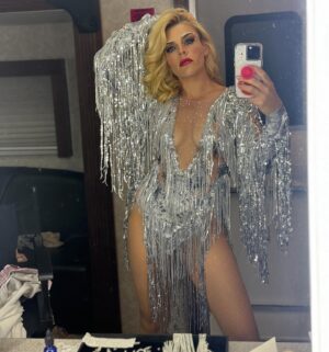 Busy Philipps Instagram - Truly it’s been really really REALLY nice to see and hear people’s reactions to finding and watching Girls5eva these last few weeks(THANK YOU💕) We obviously LOVE making the show and have all our fingers crossed for more! UNTIL THEN, here are a few more of my favorite BTS from this season- a lot of dressing room mirror selfies because our wardrobe, hair and makeup teams all CRUSHED IT BEYOND! @heme_style  @yanceyedwards  @anettelianwilliams  LOVE YOU!!!! 
Also this song is such a banger and makes me lol 💗💅🏼

But real talk(real talk) have you watched Girls5Eva on @netflix yet?