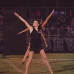 Cailey Fleming Instagram - there’s nothing quite like friday night lights 🏈😇💙 thank you so much @elwayfitzphotographyllc !!! 🤍💙🖤