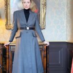 Caitríona Balfe Instagram – @belfastmovie press look 
Wearing @prada 
Styling @karlawelchstylist 
Make up @marywilesmakeup 
Hair @garethbromell 
Also thanks to all the @merchantbelfast staff who looked after us so well.