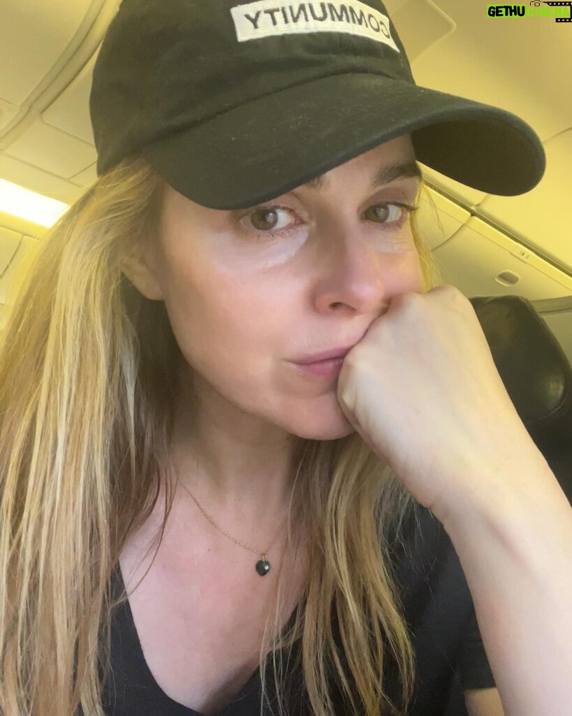 Cara Buono Instagram - Plane selfies. Been a while. Dark circles and top knot. #plane #travel #switzerland #zurich #instagood #basel #topknot #strangerthings