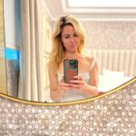 Cara Buono Instagram - Mirror and window selfies on Mallorca. And thank you @casetify for this @strangerthingstv phone case. It’s really cute and durable. I drop my phone at least 3x a week. #selfie #summer #mallorca #travel ##whitedress #lightpost #strangerthings #phonecase #klutzy