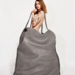 Cara Delevingne Instagram - FALABELLA FOREVER: We’d rather go naked than wear leather. Celebrating the iconic #Falabella, a HUGE achievement for #vegan fashion.  Our #StellaSummer24 star @CaraDelevingne takes a stand for #crueltyfree fashion inside our original #vegan it bag. Revolutionary then and now, the Falabella rebels against the status quo with a rocker attitude – an innovation icon setting a new standard for luxury without leather, but with the same handcraftsmanship, quality and durability as animal products.   Every year, the fashion industry kills over 1 billion animals for leather (PETA). This has a negative impact on the environment, with animal agriculture responsible for 80% of the Amazon’s deforested areas (WWF) and driving 14.5% of the world’s greenhouse gas emissions (FAO). The Falabella has never harmed a single creature, and is vegan down to the glue.  Shop the iconic Falabella in-store and at stellamccartney.com #StellaMcCartney #FalabellaForever