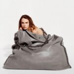 Cara Delevingne Instagram - FALABELLA FOREVER: We’d rather go naked than wear leather. Celebrating the iconic #Falabella, a HUGE achievement for #vegan fashion.  Our #StellaSummer24 star @CaraDelevingne takes a stand for #crueltyfree fashion inside our original #vegan it bag. Revolutionary then and now, the Falabella rebels against the status quo with a rocker attitude – an innovation icon setting a new standard for luxury without leather, but with the same handcraftsmanship, quality and durability as animal products.   Every year, the fashion industry kills over 1 billion animals for leather (PETA). This has a negative impact on the environment, with animal agriculture responsible for 80% of the Amazon’s deforested areas (WWF) and driving 14.5% of the world’s greenhouse gas emissions (FAO). The Falabella has never harmed a single creature, and is vegan down to the glue.  Shop the iconic Falabella in-store and at stellamccartney.com #StellaMcCartney #FalabellaForever
