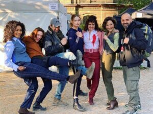 Carla Gugino Instagram - Likewise! @michelleyeoh_official
What a divine group! I’m really feelin’ it in this picture. 😂😂😂
And thanks to our stunt coordinators extraordinaire Laurent and Sébastien pictured here 💥💥. Another movie @gunpowdermilkshake coming out in UK! Check out your cinema or @skytv 
What a wonderful times with these cool ladies!