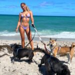 Carmen Carrera Instagram - Everyone’s a critic when they got nothing going on in their lives… Took my dogs to the beach finally 🐾 needless to say they had a very good time ☺️☀️☺️ I moved to Miami with my babies almost 3 years ago from LA in search of a better quality life and a culture that compliments my goals in fitness. Although LA taught me a lot of lessons on how to hustle and function solely out of my ego, the character building Miami offers has been so important to my growth and success in my personal life. Having a strong social character as a trans person is crucial to my work, too. As an actor, what can I truly contribute if I’m out of touch with real life? LA does have some good opportunities though, but not enough chances to flex that social muscle outside of mutually beneficial relationships for works sake.. and that can feel so robotic and unauthentic at times. I’m truly grateful for both cities and will continue to bounce back and forth. 🩵💙💛🧡💜🩷