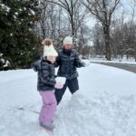 Caroline Manzo Instagram - Building a snowman with mommy @laurenmanzo - its a tiny snowman but she’s one happy little girl. ❤️❤️⛄️❄️