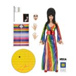 Cassandra Peterson Instagram – NECA is celebrating Pride Month early with a brand new Elvira action figure, this one a variant dubbed “Over the Rainbow Elvira.” And it’s been released this week for a great cause.

NECA previews, “The devilishly delightful Cassandra Peterson has played the part of Elvira for more than 40 years with grace, humor and more than a little camp. NECA is proud to present this “Over the Rainbow” Elvira figure, celebrating the horror and queer icon in a never-before-seen, sparkling rainbow dress for your collection.

“To spread the love, when you place an order for the Over the Rainbow Elvira on THENECASTORE.COM, you’ll receive free shipping! We’ve also joined with Cassandra to support equality for all. NECA and Elvira are proud donors to the Human Rights Campaign, which strives to end discrimination against LGBTQ  people.

“With an original tailored fabric gown, glittery ruby red heels, and a yellow brick display base, she’s definitely not in Kansas anymore! This fully articulated 8-inch action figure features new faceplate technology with two interchangeable expressions and hands, including brand new ones that allow you to recreate Elvira’s signature pose! She comes with a book accessory of Peterson’s memoir, Yours Cruelly, Elvira, and a double-sided flag with 10 stickers to customize and show your unique pride! Collector-friendly window box packaging.”

The best part? $10 from every purchase will benefit the Human Rights Campaign, which is the largest LGBTQ  political lobbying organization within the United States.
