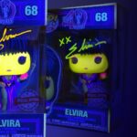 Cassandra Peterson Instagram - Who says you can’t find love in the dark? Light up your horror collection with a signed special edition Blacklight @therealelvira Funko Pop! 💜✨ Remember, things always look a little bigger and brighter under a blacklight