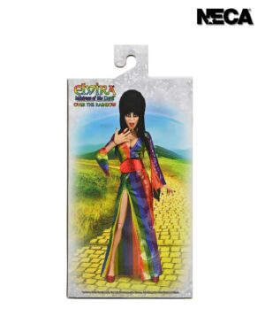Cassandra Peterson Instagram - ANNOUNCEMENT! 🏳️‍🌈 🖤
➖
Elvira - Over the Rainbow Elvira 8” Clothed Figure 
➖
Celebrate Pride Month with Elvira, Mistress of the Dark! The devilishly delightful Cassandra Peterson has played the part of Elvira for more than 40 years with grace, humor and more than a little camp. NECA is proud to present this “Over the Rainbow” Elvira figure, celebrating the horror and queer icon in a never-before-seen, sparkling rainbow dress for your collection. With an original tailored fabric gown, glittery ruby red heels, and a yellow brick display base, she’s definitely not in Kansas anymore! This fully articulated 8-inch action figure features new faceplate technology with two interchangeable expressions and hands, including brand new ones that allow you to recreate Elvira’s signature pose! She comes with a book accessory of Peterson’s memoir, “Yours Cruelly, Elvira”, and a double-sided flag with 10 stickers to customize and show your unique pride! 
➖
Available now on thenecastore.com, and shipping to your favorite NECA retailer in June!
➖
#Elvira #MistressoftheDark #Pride #OvertheRainbow #CassandraPeterson #NECA  #actionfigure
