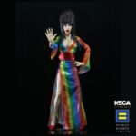 Cassandra Peterson Instagram – 🌈Elvira – Over the Rainbow Elvira 8” Clothed Figure is DROPPING on the NECA Store at 12pm ET! 🏳️‍🌈 🖤 Link in bio. 
➖
Celebrate Pride Month with Elvira, Mistress of the Dark! The devilishly delightful Cassandra Peterson has played the part of Elvira for more than 40 years with grace, humor and more than a little camp. NECA is proud to present this “Over the Rainbow” Elvira figure, celebrating the horror and queer icon in a never-before-seen, sparkling rainbow dress for your collection. To spread the love, when you place an order for the Over the Rainbow Elvira on THENECASTORE.COM, you’ll receive free shipping! We’ve also joined with Cassandra to support equality for all. NECA and Elvira are proud donors to the Human Rights Campaign, which strives to end discrimination against LGBTQ  people.
With an original tailored fabric gown, glittery ruby red heels, and a yellow brick display base, she’s definitely not in Kansas anymore! This fully articulated 8-inch action figure features new faceplate technology with two interchangeable expressions and hands, including brand new ones that allow you to recreate Elvira’s signature pose! She comes with a book accessory of Peterson’s memoir, Yours Cruelly, Elvira, and a double-sided flag with 10 stickers to customize and show your unique pride! Collector-friendly window box packaging. 
➖
In-Stock now!
➖
🌈Free shipping only applies to the Elvira – Over the Rainbow Elvira 8” Clothed Figure.
🌈A limited number come with an autograph card signed by Elvira herself! ✍️🖤 
➖
#MonsterMAYhem #Elvira #MistressoftheDark #Pride #OvertheRainbow #CassandraPeterson #NECA #NECAStore #actionfigure