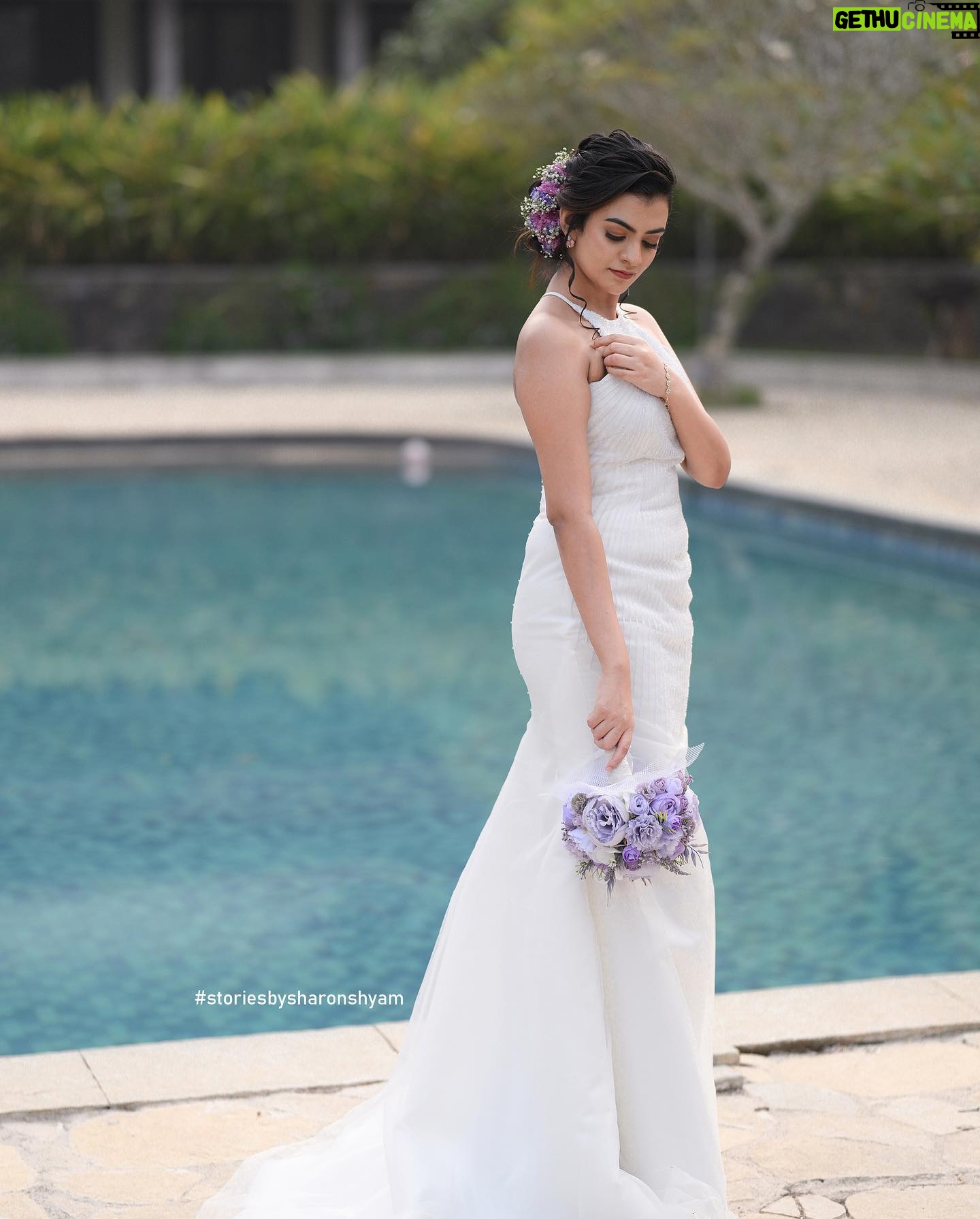 Chaithania Prakash Instagram - 🕊🤍 Airbrush makeup done with Christian gown for @briella.in Amazing gown : @briella.in Bouquet : @briellaflorals Photography : @sharon.shyam @storiesbysharonshyam Makeup & hairstyle : @soumyashyam_makeupartist Location : Whispering water resort Reels : @jeeva_balakrishnan @sumin_s_kumar Thanks : @shinil__vinod