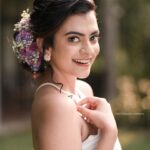 Chaithania Prakash Instagram - 🕊🤍 Airbrush makeup done with Christian gown for @briella.in Amazing gown : @briella.in Bouquet : @briellaflorals Photography : @sharon.shyam @storiesbysharonshyam Makeup & hairstyle : @soumyashyam_makeupartist Location : Whispering water resort Reels : @jeeva_balakrishnan @sumin_s_kumar Thanks : @shinil__vinod