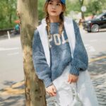 Charlene Choi Instagram - Chillin’ in style😎 Nothing beats a classic combo like a blue polo knit sweater and crisp white jeans Easy-breezy ensemble @poloralphlauren #ralphlaurenhk