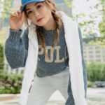 Charlene Choi Instagram - Chillin’ in style😎 Nothing beats a classic combo like a blue polo knit sweater and crisp white jeans Easy-breezy ensemble @poloralphlauren #ralphlaurenhk