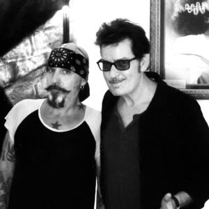 Charlie Sheen Instagram - the stache
is
back... ©