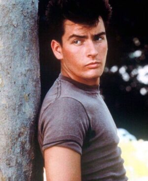 Charlie Sheen Instagram - hiding from
the drunk make-up
gal.... © #tbt