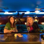 Chelsea Peretti Instagram – Director Chelsea Peretti (@chelsanity), #DOP Jonathan Furmanski (@kosherpork), and #Producer Deanna Barillari (@deannabarillari) take us #behindthescenes of #FirstTimeFemaleDirector, now streaming on @therokuchannel:

Chelsea: 
“The film is a handsome, yet unpretentious, documentary-style comedy. I didn’t want it to be overly lit or have bright sitcom colors. In my mind, a volunteer aspiring filmmaker in Glendale shot it for a small fee that could be afforded by a local theater. Still, I wanted to have moments emerge that suddenly would look more self-serious and dramatic a la Birdman.

A visual reference I wanted to explore was nature docs, which have heart, but also can make you laugh. The Muppets were also a fun visual reference, which Deanna brought to my attention.”

Jonathan:
“Chelsea and I wanted the film to feel a bit bigger in its ambition and scope. Many scenes had the entire main cast—nine people or more—and we didn’t want to just shoot singles of everyone, so those inspirations helped everything stay a little looser, a little more whimsical, and gave the cast more room to improvise. We sometimes just looked at a cute picture of meerkats standing around and used that to inspire the staging.
 
I wanted to work with Panavision on this film from the get-go because I knew they’d take very good care of us and their optics are just insanely good with almost limitless options.”
 
Deanna: 
“What I look for is the same in all areas: grounded artists with a strong work ethic, careful attention to detail and care no matter the budget. I get all of this at Panavision and Light Iron, which makes it easy to return to them time and time again. 

I laughed every day at this job—big belly laughs. Amy [Poehler] and Chelsea cared so much about the cast and crew and keeping a positive attitude on set. It was a joy.”

Chelsea:
“I have strong comedy opinions and tastes and have always had particular ideas about how funny performers around me should be used creatively, so there was always an interest in directing. I also found it extremely stimulating to think in such a layered and problem-solving way and learned a lot about how I would approach filmmaking in the future.”
