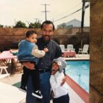 Chelsea Tavares Instagram - It’s been a month since My dad has passed. we were all nervous about posting it, because it makes it a bit more real , now that it’s public. A Post will never hold enough weight to let people know how much you impacted us and others around us. From our family, to friends, to neighbors, to the people that worked at your favorite donut shop. you were the person that loved and people called on. You were the Father to people that didn’t have a father . when our friends and ex’s fly out of state just to see you one more time before you go, you know you’re the shit. No matter what happened in life, you were always there. Always on time to pick us up from school, or the airport. You were the cook of the house. we were the house, where you knew my dad was gonna grill and make some bomb burgers or steak while mommy drank her white wine and cleaned. you quietly sized up all of me and my sisters dates.. You would leave Hershey chocolate bars on our pillows in the morning every valentine’s day. Even when mommy was mad, you grabbed her , kissed her, and would squeeze her butt until she laughed. when i think of GOOD CLASSIC music. like that bobby Caldwell , Phil collins, The Beatles, Debarge music. I think of you. The Police was our favorite band. we would play it driving down to San diego. we shared our love for vintage cars and black and white movies. you made me Look up all of the black actresses & singers that i didn’t know about from the 40’s and 50’s. Koden keeps asking for “pop pop”. it’s really hard to answer him. you said watching a movie and having a bowl of Vanilla ice cream with him , was you and koden’s “thing”. so I will continue to remind him of that. he had a bowl the other day ♥️ Currently wearing your T shirt and the bracelet you got me for my 30th. It’s so surreal. I wish I could hug you, i wish you would call me saying “i don’t want nothing, just want to tell you I love you.” There is always gonna be a hole in my heart. I wish you could have walked us down the aisle, but i believe we have too much character and personality for the spirit to just not be here any more. i can literally feel you around. we just miss you. that’s all. ♥️your “Chelsea Baby”