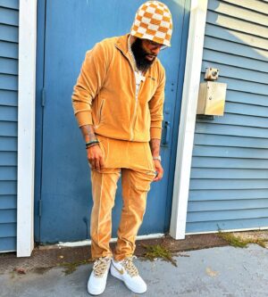 Chico Bean Instagram - “Do my best not to complain, cuz it could be worse & my outfit match the candy in your grandma’s purse”….