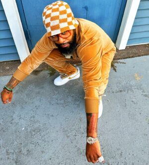 Chico Bean Instagram - “Do my best not to complain, cuz it could be worse & my outfit match the candy in your grandma’s purse”….