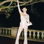 Chloë Sevigny Instagram - Look 3 Super Flower Blood Moon Total Lunar Eclipse Catsuit by @cadwallader for @muglerofficial Jewels @kentshire Shoes @manoloblahnik Bag @mrselfportrait Styling @haleywollens Flowers @pretendplantsandflowers #may15th2022 📸 @xiangyu_liu