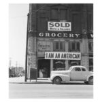 Chloe Bennet Instagram - The Matsuda family posted this sign outside their store in 1942, as they were being forcibly evacuated and moved to incarcerated camps for being Japanese American. Asian Americans no longer have to prove their Americanness. We are redefining and writing our own narrative on what it means and looks like to be an American, starting with this election. thenew.vote —— We at @runaapi joined forces with the undeniably fierce team over at @phenomenal to bring you this sweater, inspired by the Matsuda sign. —— (A cute, oversized, socially conscious, politically active, cozy look for fall? Yess pleaseee.)