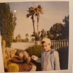 Chloe Bennet Instagram - i grew up in inner city chicago and had little to no exposure to actual “nature” and stuff, and i never actually saw cacti in real life. i legit thought that they were like dinosaurs and they were extinct or something, or like make believe plants, until i was (whatever age i was here) and we went to arizona, and i saw them everywhere and my little mind was blown, and i was so excited, so i made my brothers take polaroids of me standing next to them and also *holding hands* with them. anyway, i imagine this could never happen these days, because the internet teaches important facts like “cacti are not plant dinosaurs” and it makes me sad because it was such a (delayed lol) yet mind blowing discovery, and now i wonder if anything will ever be that pure and exciting anymore. anyways we all shouldn’t take things for granted. especially plants that don’t need water and have knives all over them. that shits crazy.
