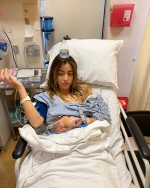 Chloe Bennet Instagram - So last Friday I got surgery to help treat my Endometriosis, a disease I have been quietly suffering from since before I can remember. I wasn’t going to post about this because it’s all very personal, and well, honestly because this is about a “feminine health issue” ... and even now, writing this out makes me feel... slightly embarrassed and uncomfortable, and I hate that. Because that feeling of embarrassment is the exact reason why so many women don’t seek out treatment. The shame that surrounds most women’s health issues often fuels the voices in our heads that tell us we are somehow “over reacting” or “shouldn’t be taken seriously”. It trickles down into how we are treated in the work place, into what is covered by insurance, and notably, how heath care professionals treat us. It took me many years of trying different doctors, late night google searches, and just believing that being in a severe amount of pain ALL the time WAS NOT normal and doesn’t have to be to get treatment. It took finding an incredible doctor who could not only validate my symptoms with an immense amount of knowledge on the disease, but most importantly she encouraged me to be absolutely shameless about it. It’s a luxury to not feel shame about something after so long. Ultimately I’m sharing this because so much of what has helped me over the past 10 years has been the small little blogs or the random articles, the Endo Instagram accounts, or the Lena Dunham’s of the world (she is a BADASS) sharing their stories, despite what it must look like to everyone else. Whether it’s Endometriosis, PCOS, hormone imbalances, dealing with the insane side effects of birth controls, GIVING (Fucking) BIRTH, or just a regular old period, I feel like we need to talk about it. Normalize the conversation. Feel no shame. No more passing tampons in our sleeves or under the table so the boys don’t see, that shits whack.
So yeah, I guess I’m  speaking about this now because my instinct has always been to act like it’s no big deal, tolerate the pain  and just not talk about it. 
So this is me talking about it. (And also despite being high as a kite, I looked cute in these compression socks)