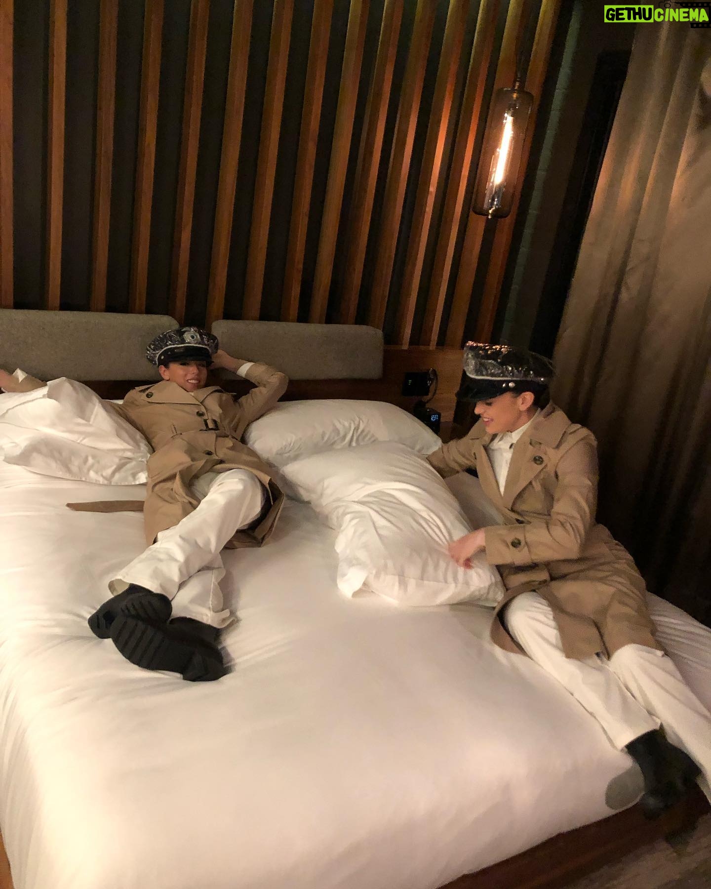 Chloe Bennet Instagram - OKAY. So for last nights episode of #agentsofshield Elizabeth and I were told we had a night shoot at The Roosevelt hotel. The hotel is a staple in Hollywood and oozes Hollywood glam, so we were over the moon because we thought “omg wowww we get to both have this really fun glamorous night of shooting, maybe in ball gowns or some fancy cocktail situation, like, yesss we finally made it in Hollywood!”... but then we find out we were shooting scenes dressed as a morticians, in the rain, and would be shooting in FULL period piece mortician outfits, along with beige wet suits underneath. So pretty much the exact opposite of what we thought the night was gonna be. Which we thought was veryyy funny for some reason. And then guys guess what?...turns out there is literally NOTHING more fun than running around a fancy hotel dressed as a 1950’s mortician. I have over 214 pictures/videos of that night. I don’t know why we thought this was so funny. Hands down one of my favorite nights of shooting. But anyway I’ve been waiting to post these bts shots for over a year now and I’m so glad the world gets to see them, cause they are very important lol. @lil_henstridge l I lo0o0o0vveeee uuuuuu. Edit: wow this caption is all over the place, but you get it right?