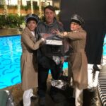 Chloe Bennet Instagram - OKAY. So for last nights episode of #agentsofshield Elizabeth and I were told we had a night shoot at The Roosevelt hotel. The hotel is a staple in Hollywood and oozes Hollywood glam, so we were over the moon because we thought “omg wowww we get to both have this really fun glamorous night of shooting, maybe in ball gowns or some fancy cocktail situation, like, yesss we finally made it in Hollywood!”... but then we find out we were shooting scenes dressed as a morticians, in the rain, and would be shooting in FULL period piece mortician outfits, along with beige wet suits underneath. So pretty much the exact opposite of what we thought the night was gonna be. Which we thought was veryyy funny for some reason. And then guys guess what?...turns out there is literally NOTHING more fun than running around a fancy hotel dressed as a 1950’s mortician. I have over 214 pictures/videos of that night. I don’t know why we thought this was so funny. Hands down one of my favorite nights of shooting. But anyway I’ve been waiting to post these bts shots for over a year now and I’m so glad the world gets to see them, cause they are very important lol. @lil_henstridge l I lo0o0o0vveeee uuuuuu. Edit: wow this caption is all over the place, but you get it right?