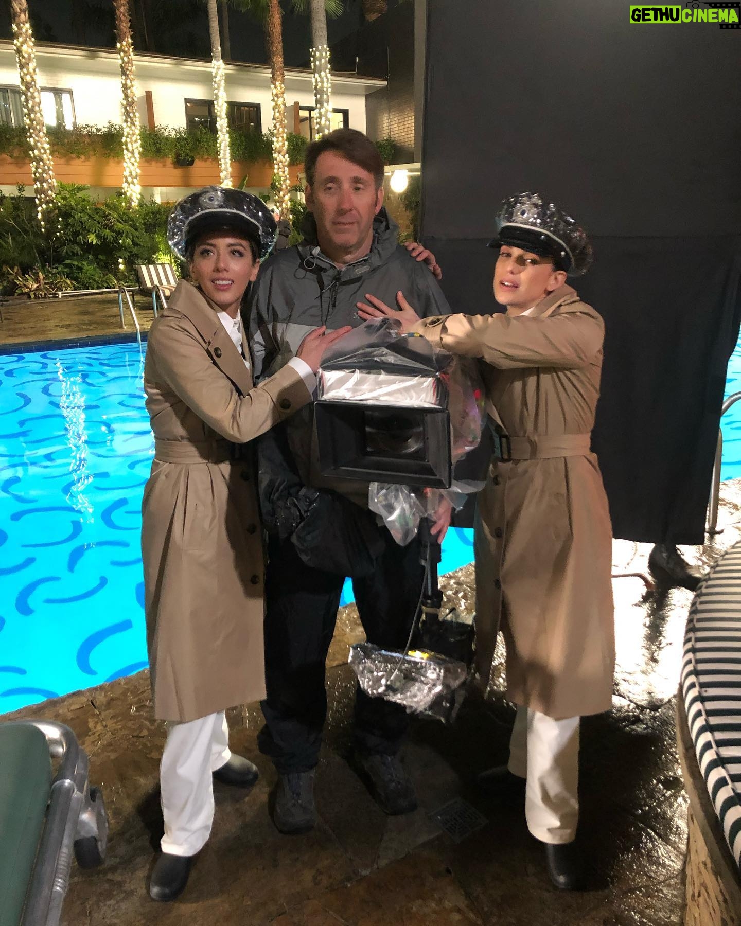 Chloe Bennet Instagram - OKAY. So for last nights episode of #agentsofshield Elizabeth and I were told we had a night shoot at The Roosevelt hotel. The hotel is a staple in Hollywood and oozes Hollywood glam, so we were over the moon because we thought “omg wowww we get to both have this really fun glamorous night of shooting, maybe in ball gowns or some fancy cocktail situation, like, yesss we finally made it in Hollywood!”... but then we find out we were shooting scenes dressed as a morticians, in the rain, and would be shooting in FULL period piece mortician outfits, along with beige wet suits underneath. So pretty much the exact opposite of what we thought the night was gonna be. Which we thought was veryyy funny for some reason. And then guys guess what?...turns out there is literally NOTHING more fun than running around a fancy hotel dressed as a 1950’s mortician. I have over 214 pictures/videos of that night. I don’t know why we thought this was so funny. Hands down one of my favorite nights of shooting. But anyway I’ve been waiting to post these bts shots for over a year now and I’m so glad the world gets to see them, cause they are very important lol. @lil_henstridge l I lo0o0o0vveeee uuuuuu. Edit: wow this caption is all over the place, but you get it right?
