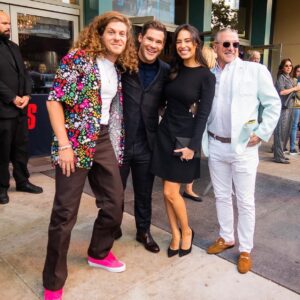 Chloe Bridges Instagram - Some pictures from the Out-laws premiere which is ON NETFLIX TODAY. This is a special one - adam started developing it in 2016, got incredible producing partners in @thatallencovert @adamsandler & happy madison, and then this incredible cast @nina @piercebrosnanofficial @michael_rooker @poornagraphy @comedianlilrel etc.. plus the New York Times said adam was finally funny and I know he’s been looking forward to that. Proud of you @adamdevine #theoutlaws @netflix