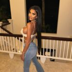Chloe Khan Instagram - Head to toe in @FashionNova PIC 1,2OR3? Top : Pearls On Pearls Bralette - Ivory Jeans : Then And Now Flare Jeans - Light Wash