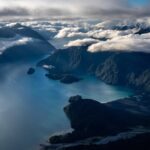Chris Burkard Instagram - The canyon shown above is home to the Rio Palena - a powerful river system teeming with salmon and trout that eventually feeds into the South Pacific traveling through 150 miles of striking landscapes. This particular night, i noticed a storm rolling in close to the @elevenexperience lodge and decided to put the drone up (despite significant wind) to capture the sunset and idyllic lenticular clouds that are commonly seen in Patagonia, brushed by wind swirling at high speeds. During this assignment, I also had the opportunity to spend a lot of time flying with @aeroalerce - affording me a more in depth intake of the landscape but still just an introduction into over 2,300 islands that sit off the coast of Chile and over 800 fjords. It’s still a little hard to process the sheer amount of landscape here and I’m excited to continue to explore it