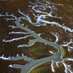 Chris Burkard Instagram - California’s Carrizo Plains & Cuyama Valley provide little access even with a good 4x4 vehicle for those hoping to photograph the surrounding ridges… while planning this particular assignment, we felt that flying in an Lightweight Aerial Trike and a Cessna seemed the best way to capture the dramatic effects of the super bloom in a way that gave genuine context to the landscape… something I value when putting together a body of work. Throughout my career, @natgeo has always been an incredible example of showcasing the earth and the important stories that it has to share… so this assignment to document California’s super bloom following significant winter rainfall in 2023 felt a little extra special being so close to my home.