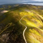 Chris Burkard Instagram - California’s Carrizo Plains & Cuyama Valley provide little access even with a good 4x4 vehicle for those hoping to photograph the surrounding ridges… while planning this particular assignment, we felt that flying in an Lightweight Aerial Trike and a Cessna seemed the best way to capture the dramatic effects of the super bloom in a way that gave genuine context to the landscape… something I value when putting together a body of work. Throughout my career, @natgeo has always been an incredible example of showcasing the earth and the important stories that it has to share… so this assignment to document California’s super bloom following significant winter rainfall in 2023 felt a little extra special being so close to my home.