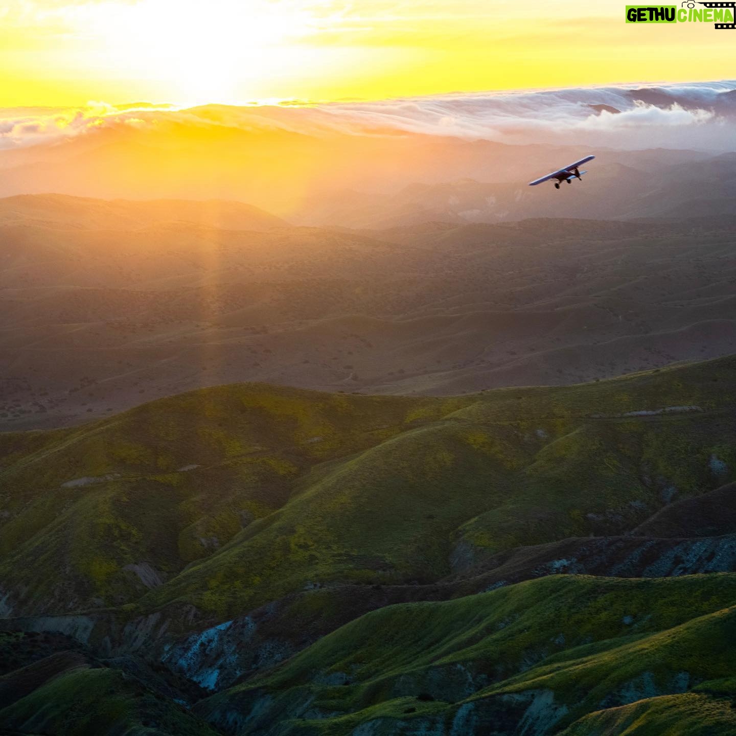 Chris Burkard Instagram - California’s Carrizo Plains & Cuyama Valley provide little access even with a good 4x4 vehicle for those hoping to photograph the surrounding ridges… while planning this particular assignment, we felt that flying in an Lightweight Aerial Trike and a Cessna seemed the best way to capture the dramatic effects of the super bloom in a way that gave genuine context to the landscape… something I value when putting together a body of work. Throughout my career, @natgeo has always been an incredible example of showcasing the earth and the important stories that it has to share… so this assignment to document California’s super bloom following significant winter rainfall in 2023 felt a little extra special being so close to my home.