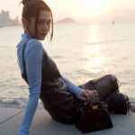 Chrissie Chau Instagram - Have a nice day 💙🖤 @Fendi #FendiFW23 #FendiPeekaboo Hair: @singsing113 @artify.lab Makeup: @circleeeee_makeup #haveaniceday #ootd