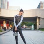 Chrissie Chau Instagram - Have a nice day 💙🖤 @Fendi #FendiFW23 #FendiPeekaboo Hair: @singsing113 @artify.lab Makeup: @circleeeee_makeup #haveaniceday #ootd