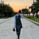 Chrissie Chau Instagram - Have a nice day 💙🖤 @Fendi #FendiFW23 #FendiPeekaboo Hair: @singsing113 @artify.lab Makeup: @circleeeee_makeup #haveaniceday #ootd