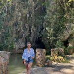 Chrissie Fit Instagram - Who would’ve pegged me as a guajira? Los paisajes de Cuba son una maravilla. The Cuban countryside is unreal. I recommend you go there and buy tobacco directly from the farmers. They are forced to give 90% of their crops to the government and only have 10% to sell themselves. It’s more authentic this way and you’re helping the farmer, who takes so much pride in growing their tobacco, fruits, veggies, and coffee. Btw, I did not know how to smoke a cigar. At the risk of losing my Cuban card, I will post in my stories 😅 #Cuba #Vinales #CuevaDelIndio #palenquedeloscimarrones #cubancountryside #ReturnToMyRoots #CubanHeritage #Cuban #Guajiro #Guajira