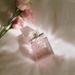 Christian Serratos Instagram - Back in Paris with @Dior @Diorbeauty! I wore Miss Dior Blooming Bouquet perfume through the streets of Paris. The show was stunning @mariagraziachiuri #DiorFW23 #MissDior #LoveIsABouquet