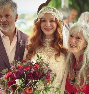 Christina Hendricks Instagram - My mother has Alzheimer’s and was not able to come to New Orleans for our wedding, so we brought the wedding to her yesterday in our backyard. My mother has always been my best friend and there was no way we weren’t going to share our love and celebrate with the biggest supporter and cheerleader in my life. When you are living so in the moment, so in the present, it is so important to have beauty and love and happiness around you. This time we had flower girls and dogs and more wonderful friends join us. @garbage surprised us with a Scottish wedding twist to this ceremony and it was another perfect day. @gillyflowersla made beautiful arrangements inspired by our New Orleans wedding and who wouldn’t want to wear their wedding dress twice!!! @katyakatyalondon @clairepettibone #alzheimers
