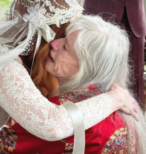 Christina Hendricks Instagram - My mother has Alzheimer’s and was not able to come to New Orleans for our wedding, so we brought the wedding to her yesterday in our backyard. My mother has always been my best friend and there was no way we weren’t going to share our love and celebrate with the biggest supporter and cheerleader in my life. When you are living so in the moment, so in the present, it is so important to have beauty and love and happiness around you. This time we had flower girls and dogs and more wonderful friends join us. @garbage surprised us with a Scottish wedding twist to this ceremony and it was another perfect day. @gillyflowersla made beautiful arrangements inspired by our New Orleans wedding and who wouldn’t want to wear their wedding dress twice!!! @katyakatyalondon @clairepettibone #alzheimers